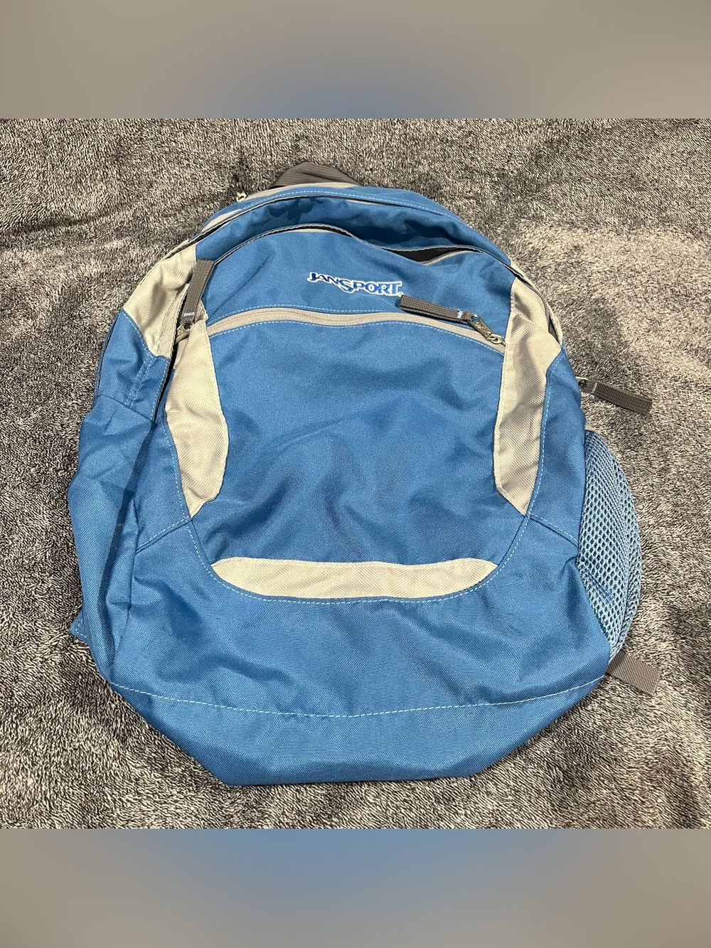 Blue Jansport Backpack unisex